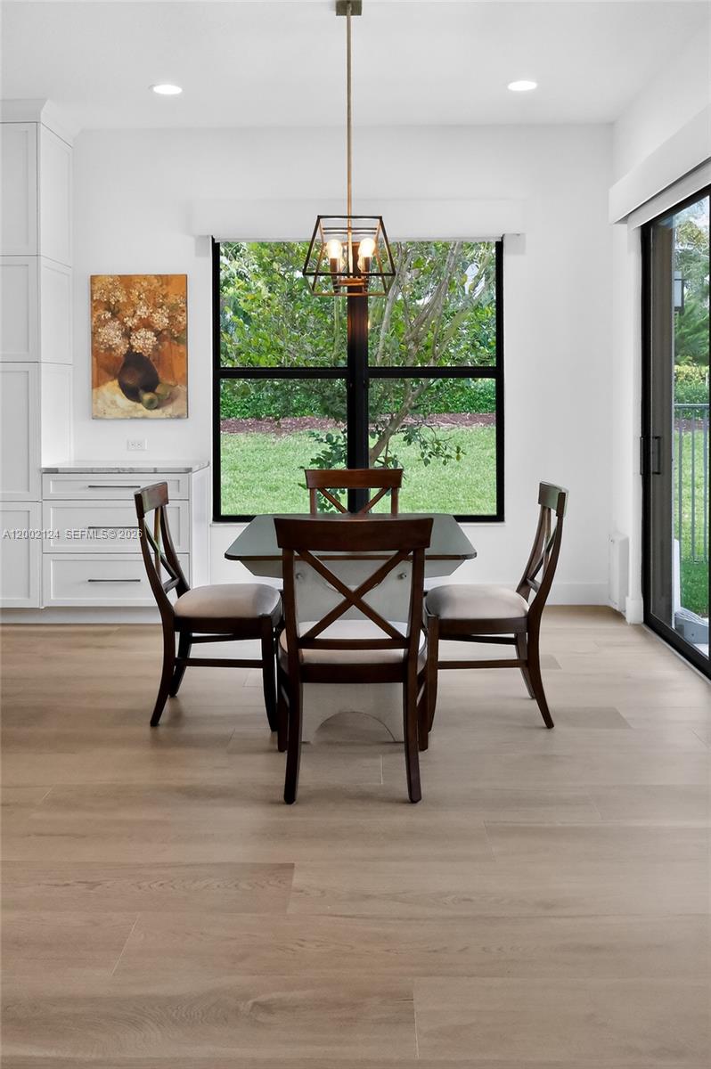 8871 New River Falls Road Boca Raton, FL 33496 - Photo 15 of 47 Dining area w Garden view