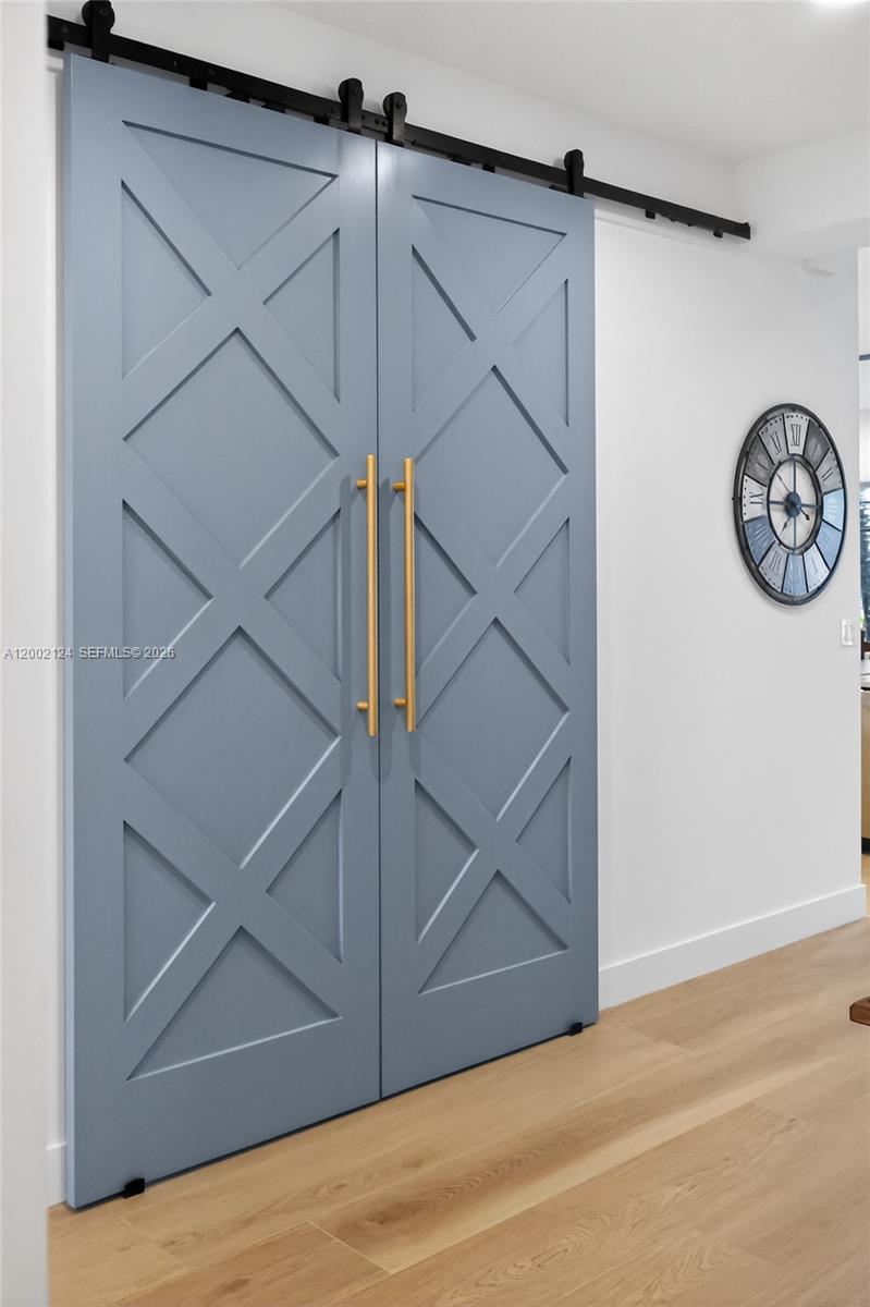 8871 New River Falls Road Boca Raton, FL 33496 - Photo 27 of 47 Barn doors to Den - Office