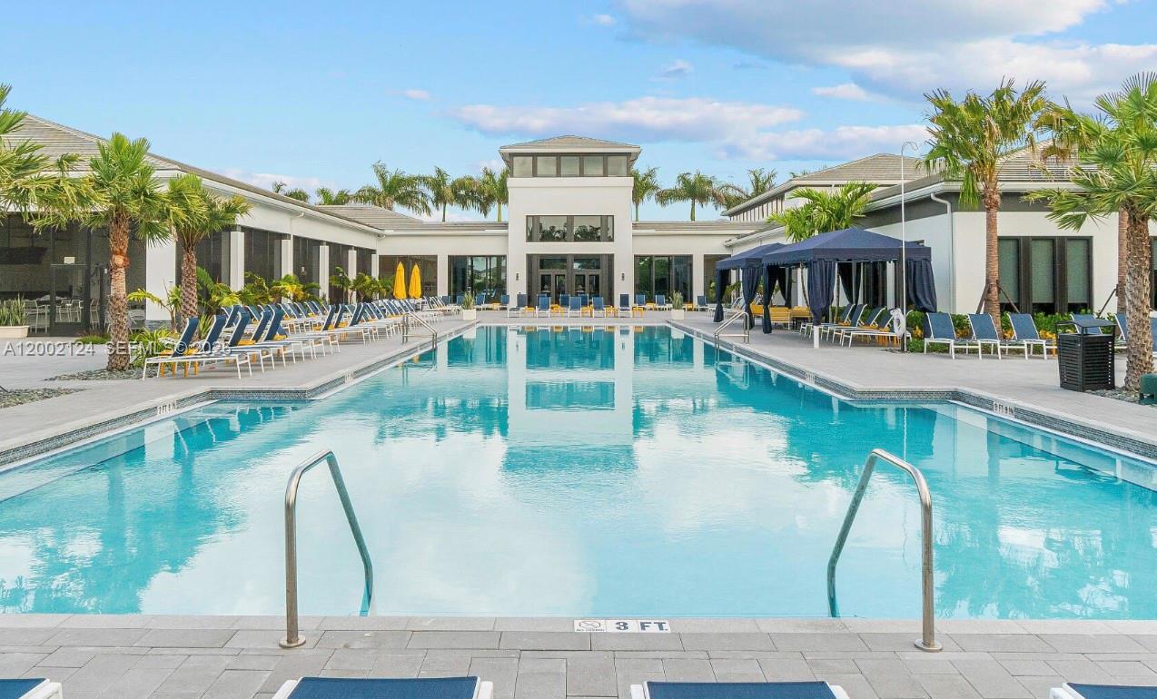 8871 New River Falls Road Boca Raton, FL 33496 - Photo 45 of 47 a view of a house with pool and sitting area