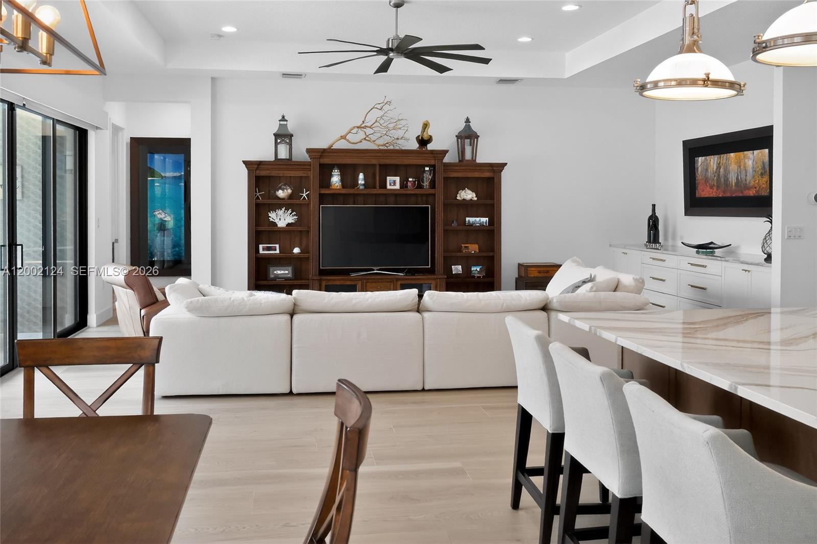 8871 New River Falls Road Boca Raton, FL 33496 - Photo 8 of 47 Great Room, Kitchen Island and Dining areas