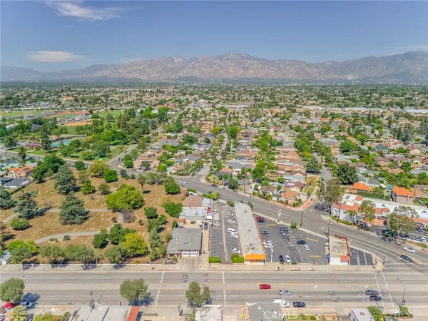an aerial view of residential houses and outdoor space
