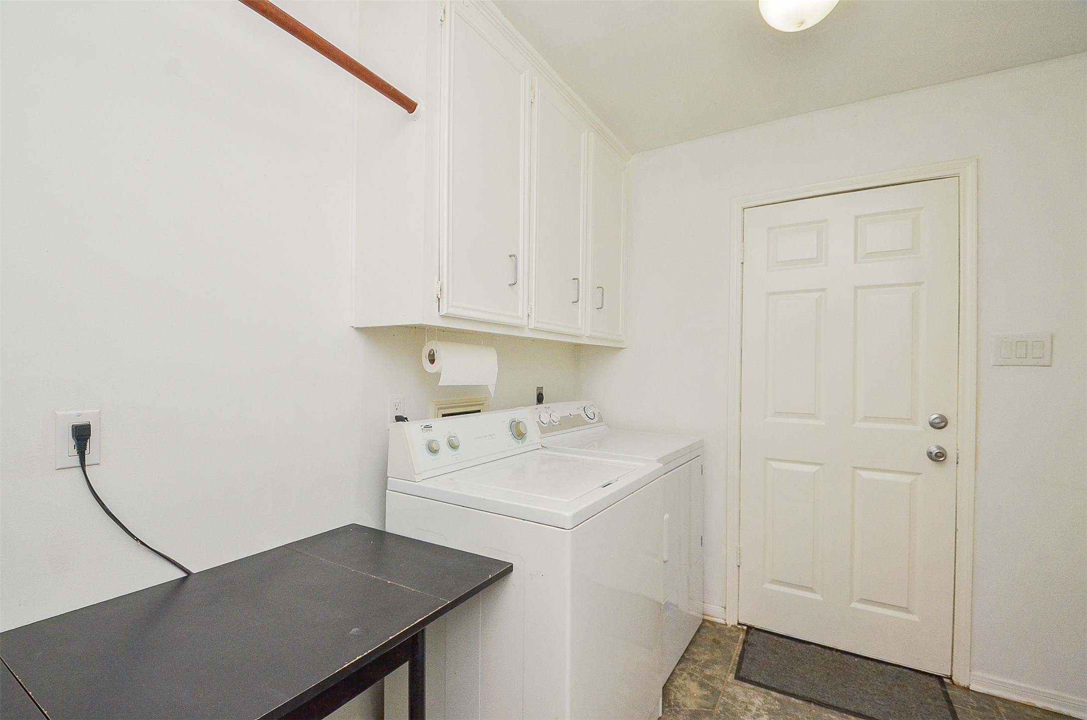 710 South Fry Road Katy, TX 77450 - Photo 34 of 50 Utility room with entrance from garage and additional closet and shelf spaces.