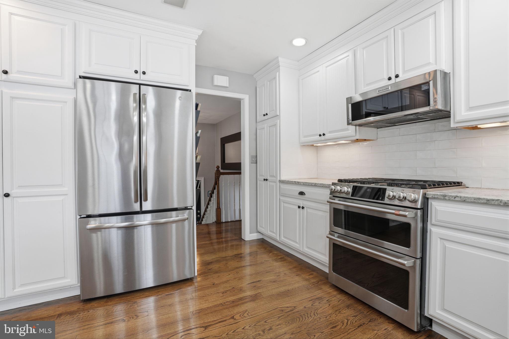 521 Cokesbury Road Annandale, NJ 08801 - Photo 15 of 56 a kitchen with stainless steel appliances and granite countertop wooden cabinets
