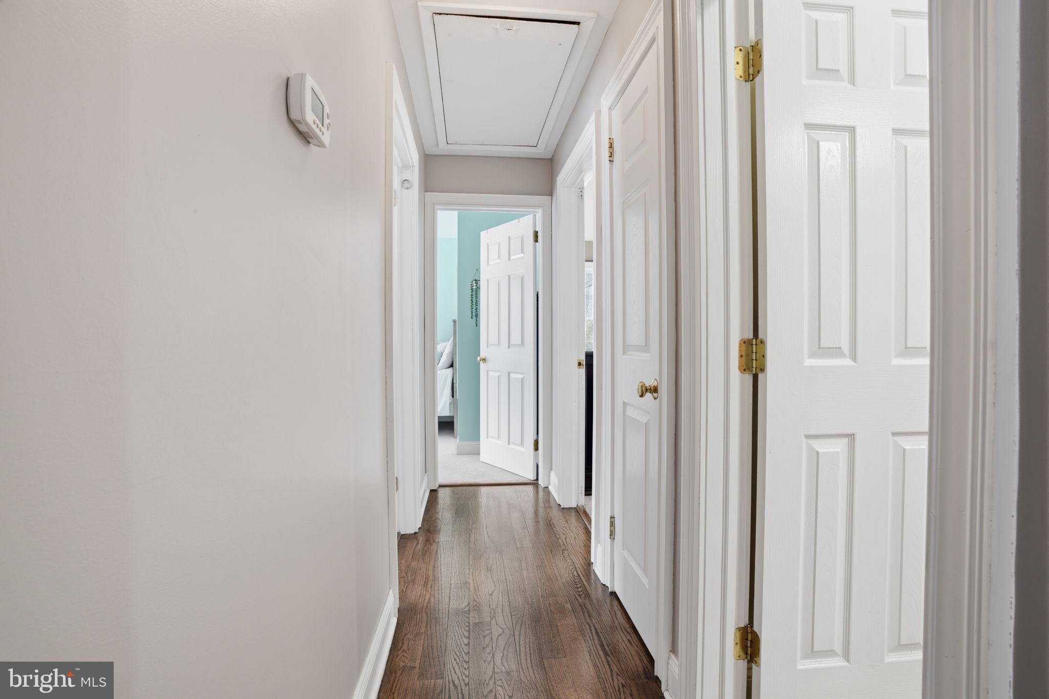 521 Cokesbury Road Annandale, NJ 08801 - Photo 17 of 56 a view of a hallway with wooden floor