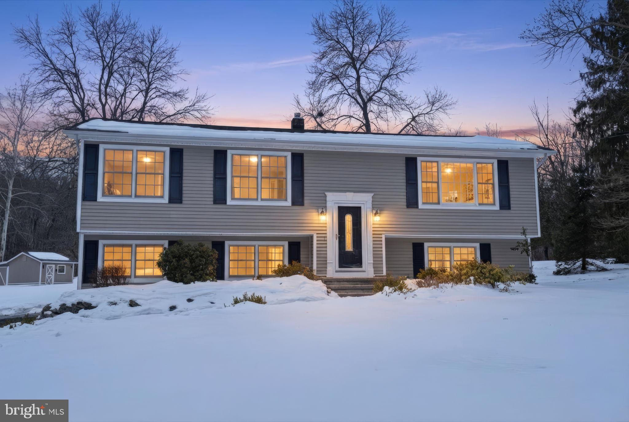 521 Cokesbury Road Annandale, NJ 08801 - Photo 2 of 56 a front view of a house with a yard