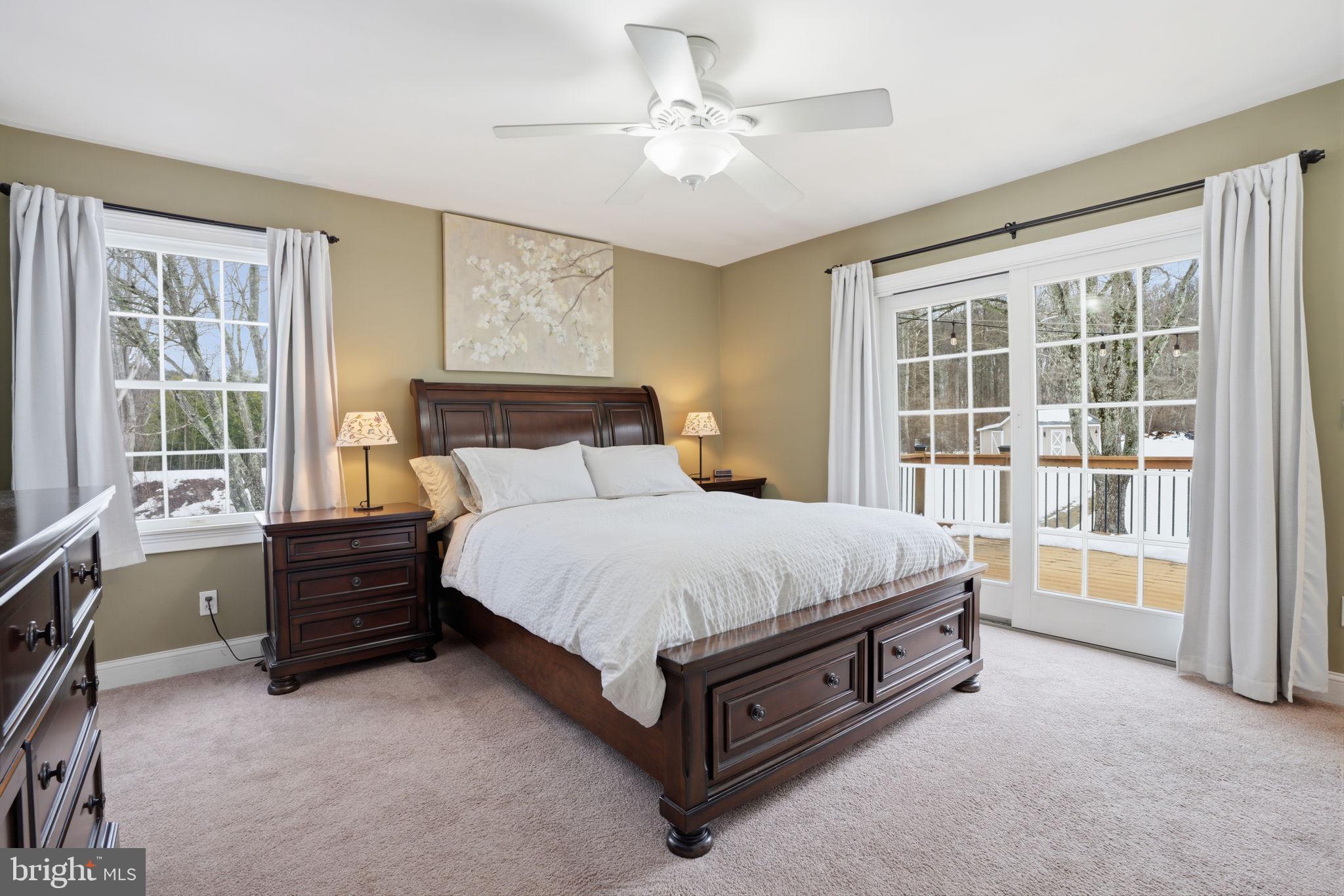 521 Cokesbury Road Annandale, NJ 08801 - Photo 22 of 56 a bed sitting in a spacious bedroom next to a window