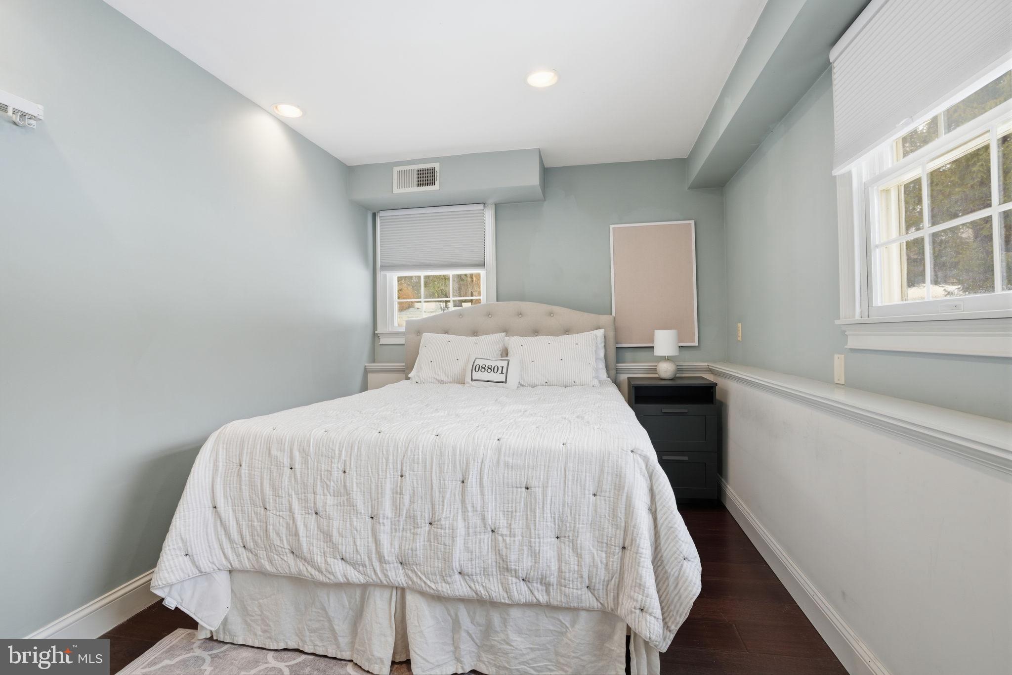 521 Cokesbury Road Annandale, NJ 08801 - Photo 28 of 56 a bedroom with a bed and a window