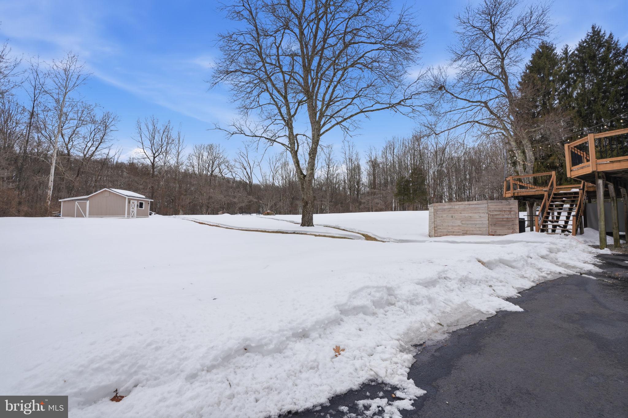 521 Cokesbury Road Annandale, NJ 08801 - Photo 35 of 56 a street view covered with snow