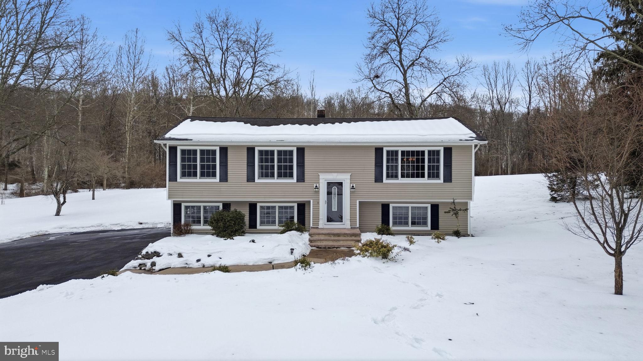 521 Cokesbury Road Annandale, NJ 08801 - Photo 44 of 56 a front view of a house with a yard