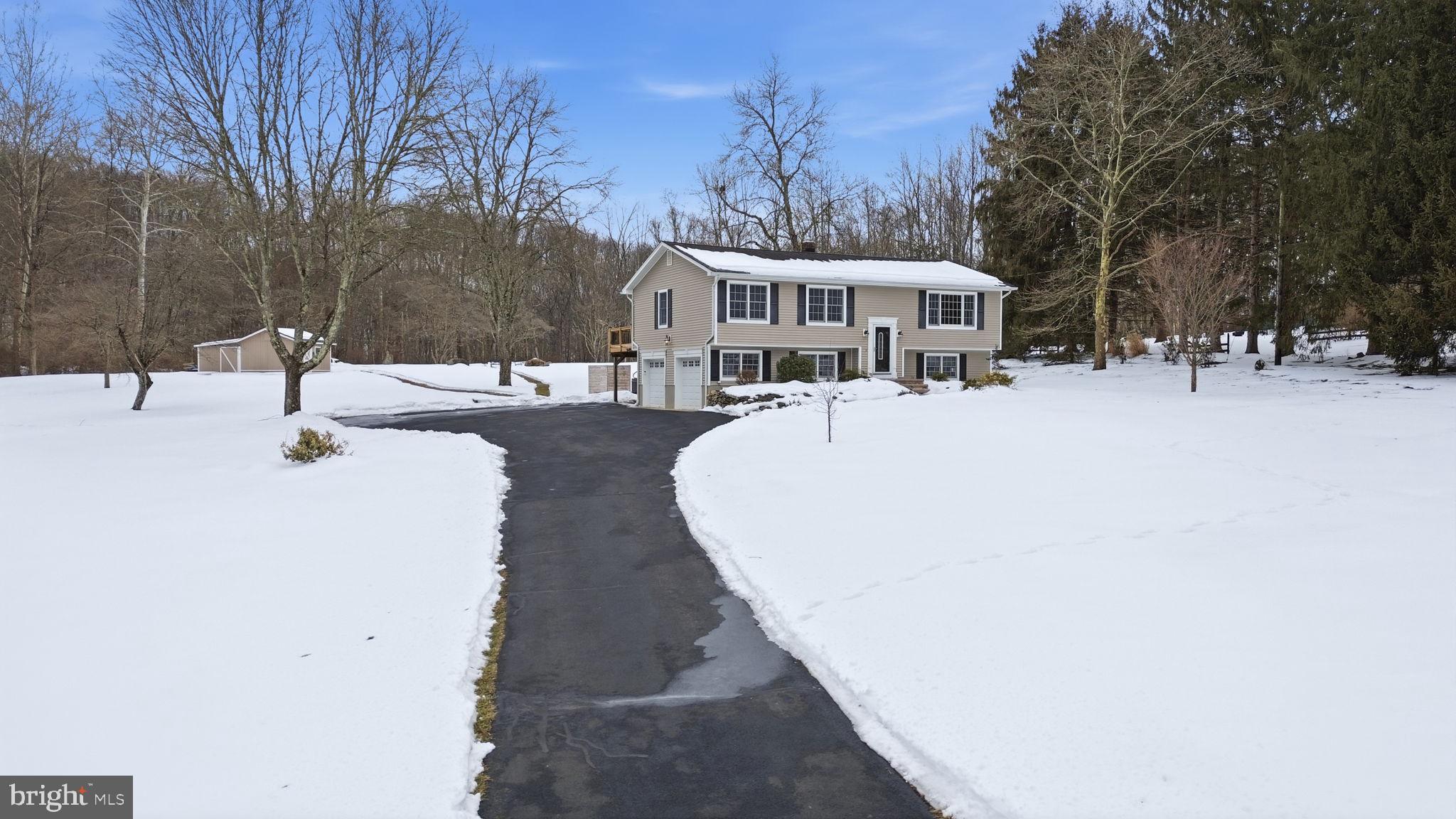 521 Cokesbury Road Annandale, NJ 08801 - Photo 47 of 56 a view of a house with snow on the road