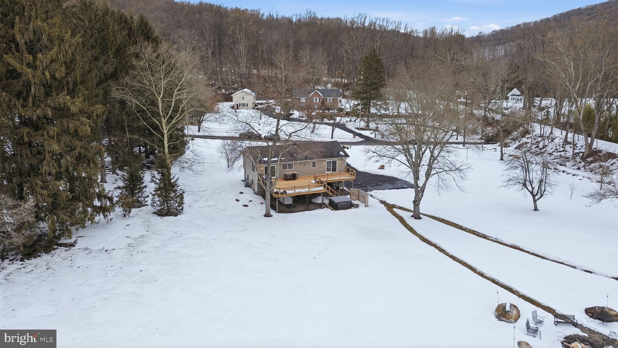 521 Cokesbury Road Annandale, NJ 08801 - Photo 50 of 56 a view of a terrace with a bench