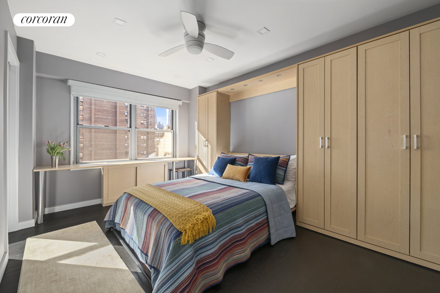 360 East 72nd Street, Unit B1209 Manhattan, NY 10021 - Photo 11 of 14 a bedroom with a large bed and a window