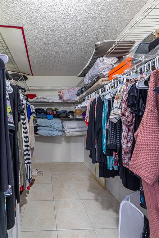 1902 Bermuda Circle, Unit L4 Coconut Creek, FL 33066 - Photo 14 of 27 Master Suite Walk-in Closet