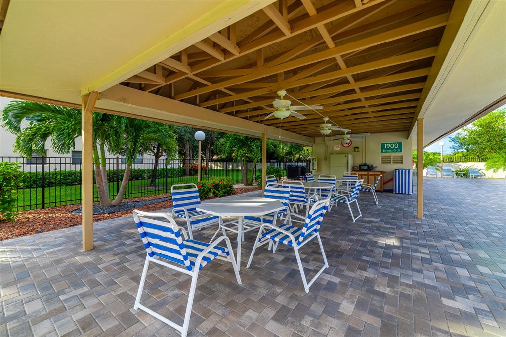 1902 Bermuda Circle, Unit L4 Coconut Creek, FL 33066 - Photo 23 of 27 Pool and Clubhouse Area