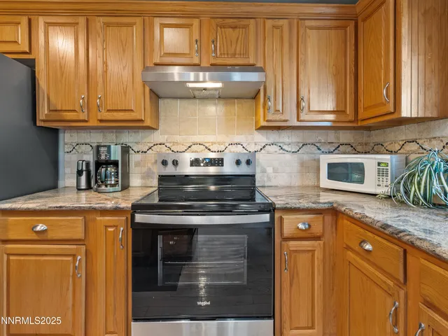 a bathroom with a sink toilet and mirror