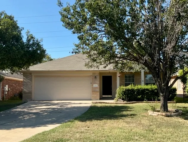 a house with trees in the background