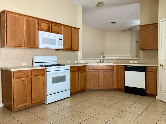a bathroom with a sink and a window