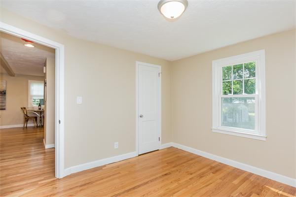 104 Roy Street Springfield, MA 01104 - Photo 22 of 30 a view of empty room with wooden floor