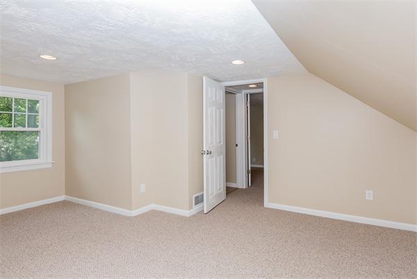 104 Roy Street Springfield, MA 01104 - Photo 26 of 30 an empty room with windows and closet