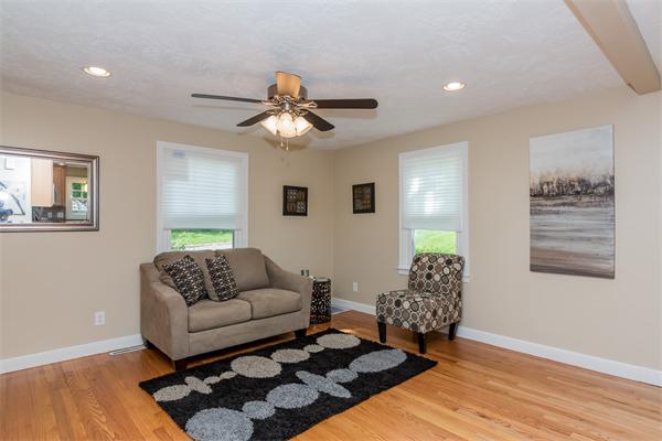 104 Roy Street Springfield, MA 01104 - Photo 8 of 30 a living room with furniture and wooden floor
