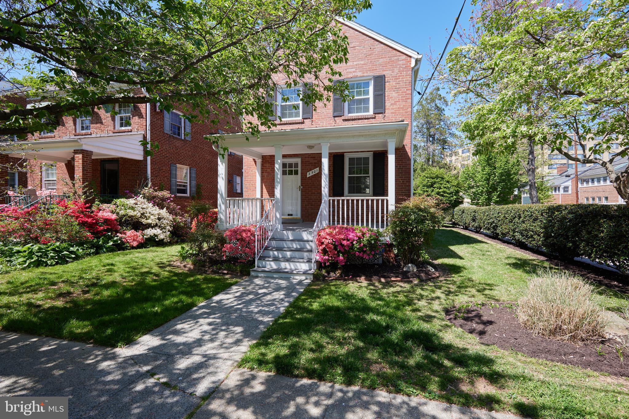 3501 Alton Place Northwest Washington, DC 20008 - Photo 1 of 29 a front view of a house with a yard and a garden