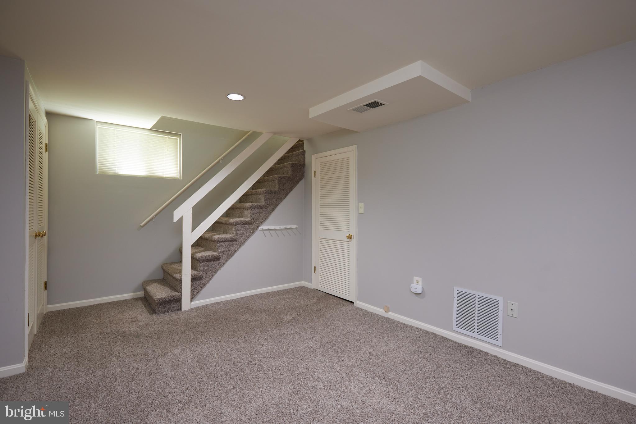 3501 Alton Place Northwest Washington, DC 20008 - Photo 21 of 29 a view of an empty room with stairs
