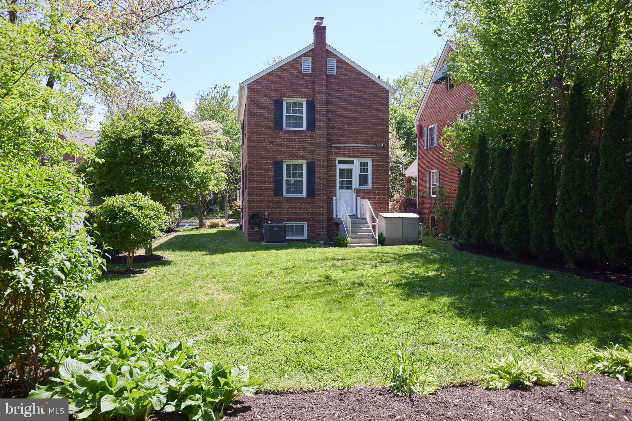 3501 Alton Place Northwest Washington, DC 20008 - Photo 26 of 29 front view of a house with a yard