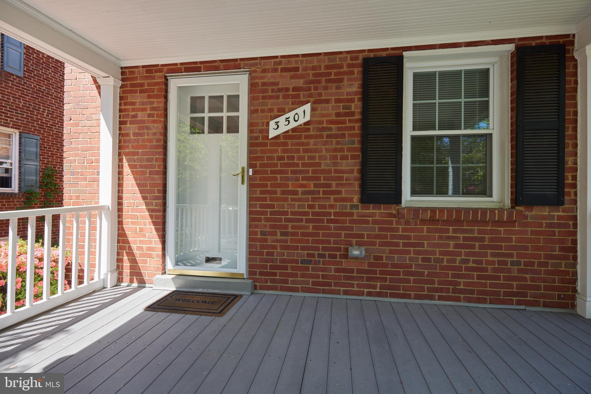 3501 Alton Place Northwest Washington, DC 20008 - Photo 3 of 29 a view of front door of house with wooden floor