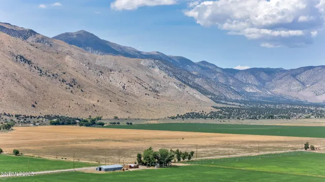 a view of a lake with mountain in the background