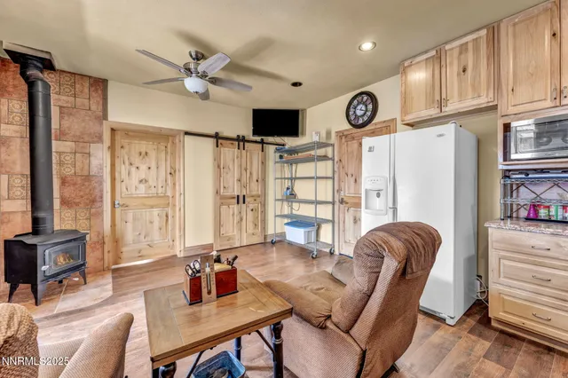 a work room with furniture and wooden floor