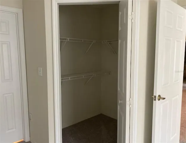 a bathroom with a glass door