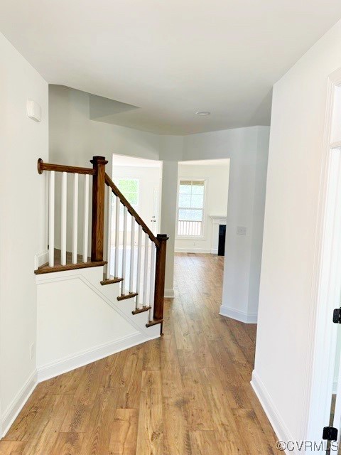 9249 Moldova Road Chesterfield, VA 23832 - Photo 2 of 22 a view of a hallway with wooden floor and staircase