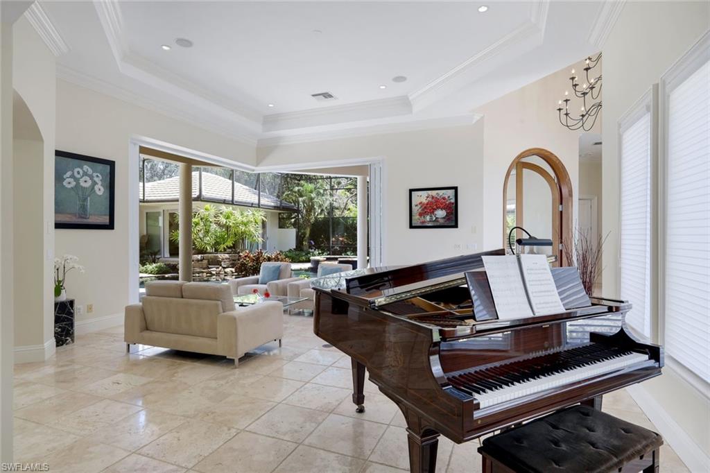 1284 Pocantico Lane Naples, FL 34110 - Photo 11 of 50 12-14 Ft. Ceilings for Light-Filled Interiors