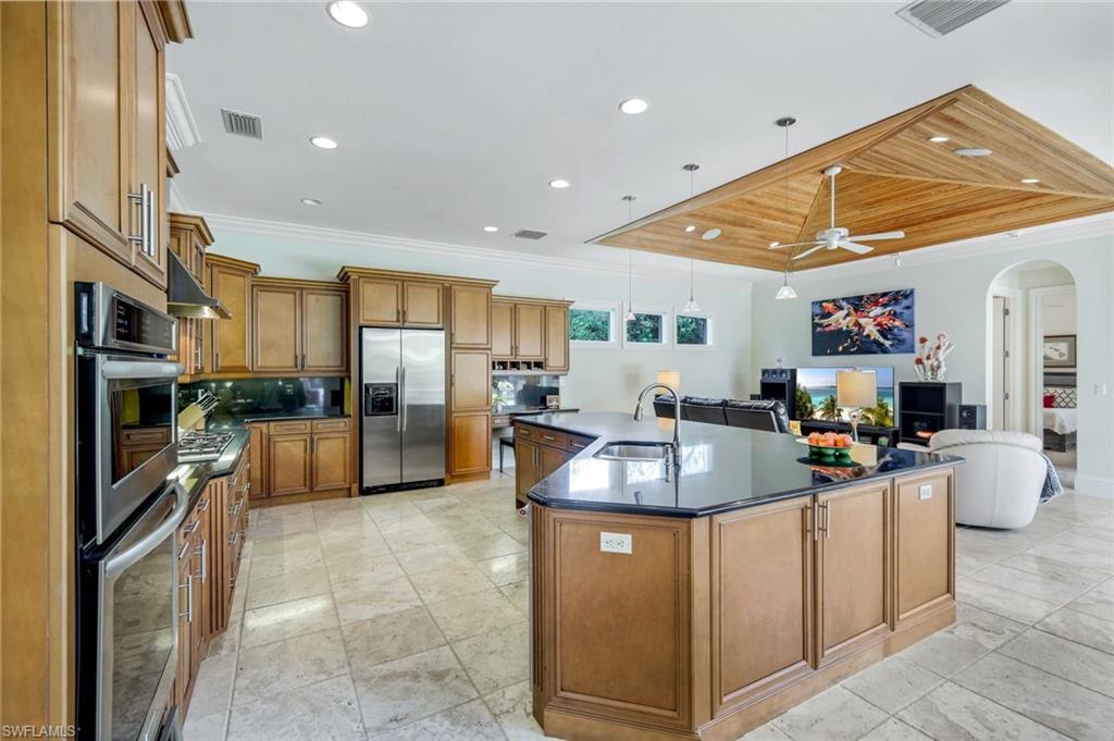 1284 Pocantico Lane Naples, FL 34110 - Photo 21 of 50 Custom Wood Cabinetry w/ Ample Pull-Out Shelves
