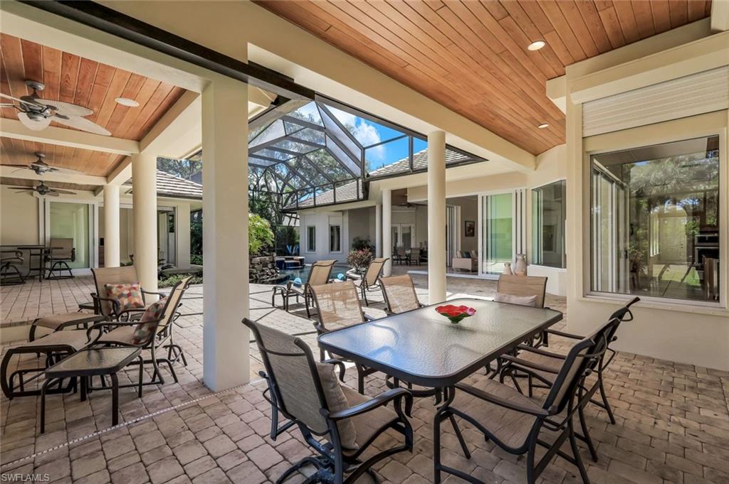 1284 Pocantico Lane Naples, FL 34110 - Photo 29 of 50 Extensive Covered Spaces for Outdoor Lounging & Entertaining