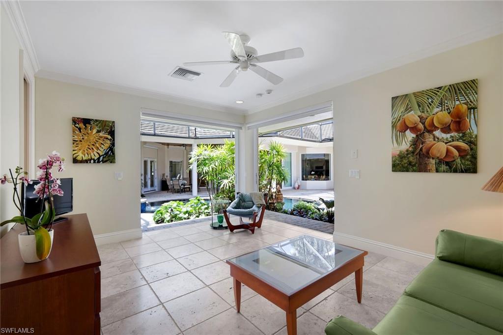 1284 Pocantico Lane Naples, FL 34110 - Photo 45 of 50 Cabana Suite w/ Disappearing Glass Doors to Lanai
