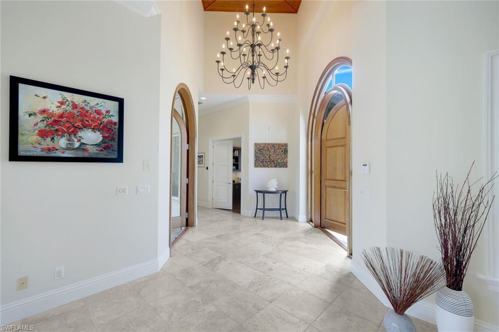 1284 Pocantico Lane Naples, FL 34110 - Photo 5 of 50 Foyer w/ Dramatic 14-Ft. Ceiling & Designer Chandelier