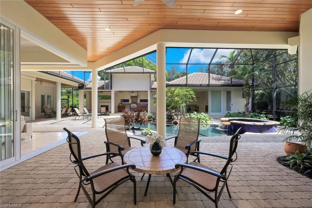 1284 Pocantico Lane Naples, FL 34110 - Photo 9 of 50 Expansive Outdoors Both Shaded & Sunlit