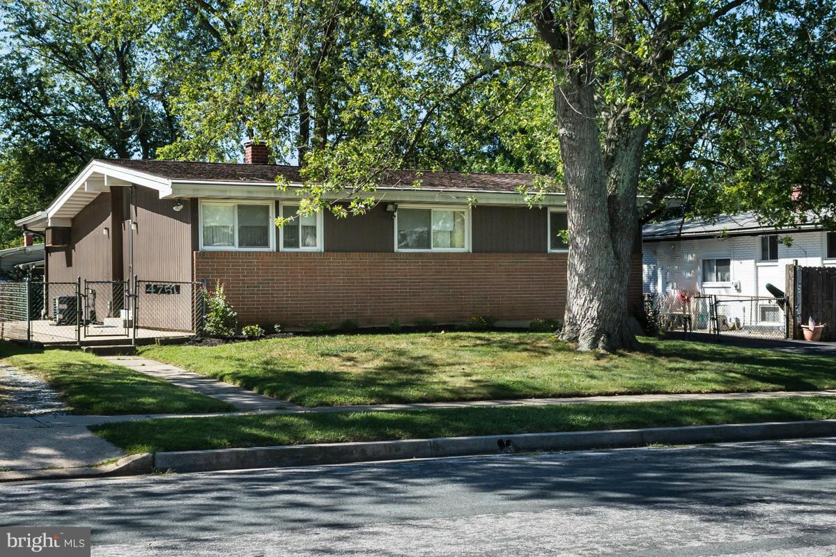 4757 Bonnie Brae Road Pikesville, MD 21208 - Photo 1 of 30 a house view with a sitting space and garden