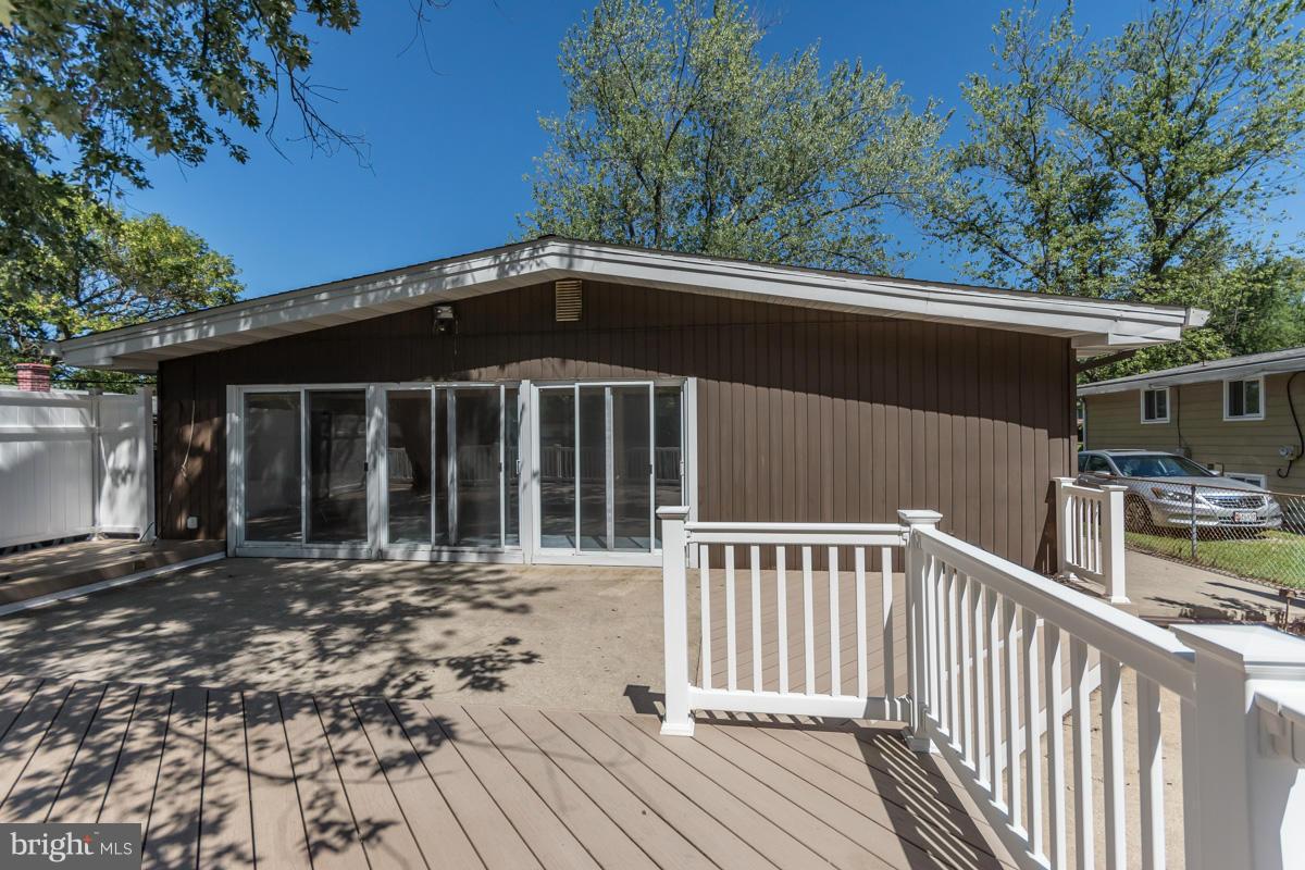 4757 Bonnie Brae Road Pikesville, MD 21208 - Photo 29 of 30 a view of a house with a deck
