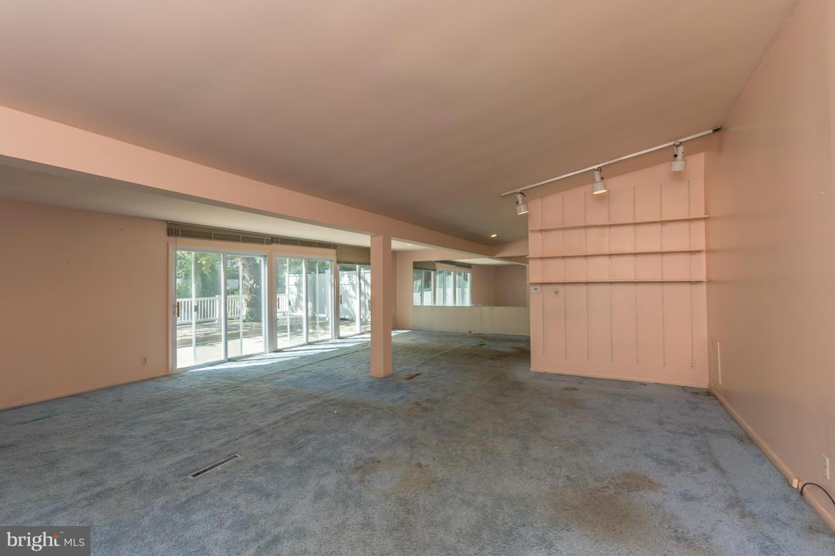 4757 Bonnie Brae Road Pikesville, MD 21208 - Photo 5 of 30 a view of an empty room with a window