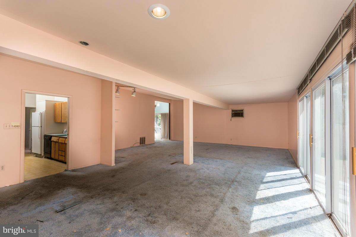 4757 Bonnie Brae Road Pikesville, MD 21208 - Photo 6 of 30 an empty room with windows