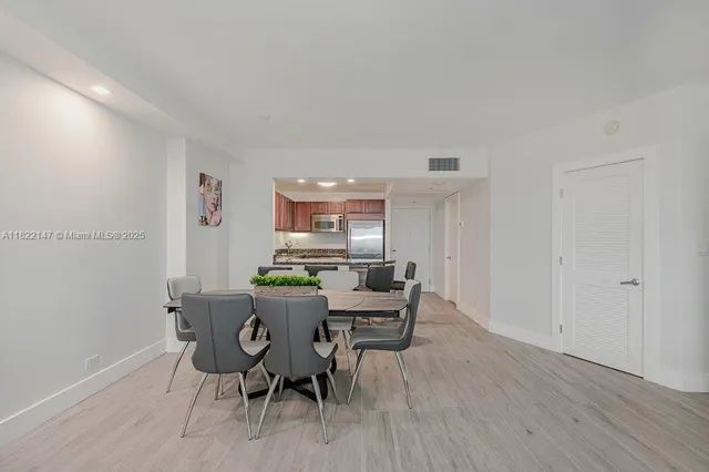 a bedroom with a bed and a chair