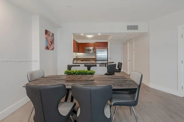 a view of a dining room with furniture