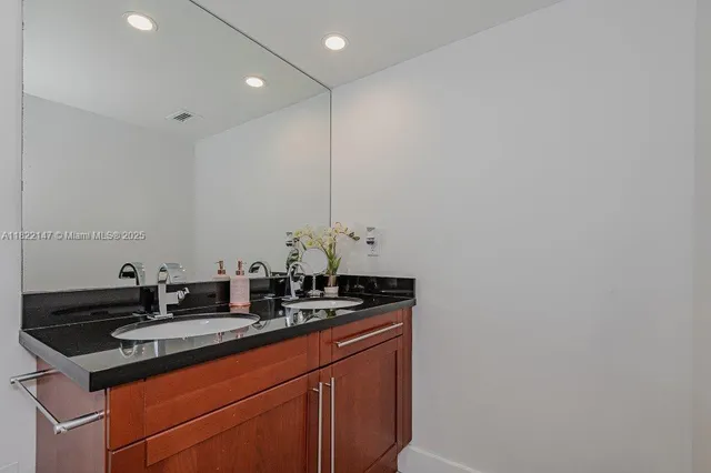 a bathroom with a shower and bathtub