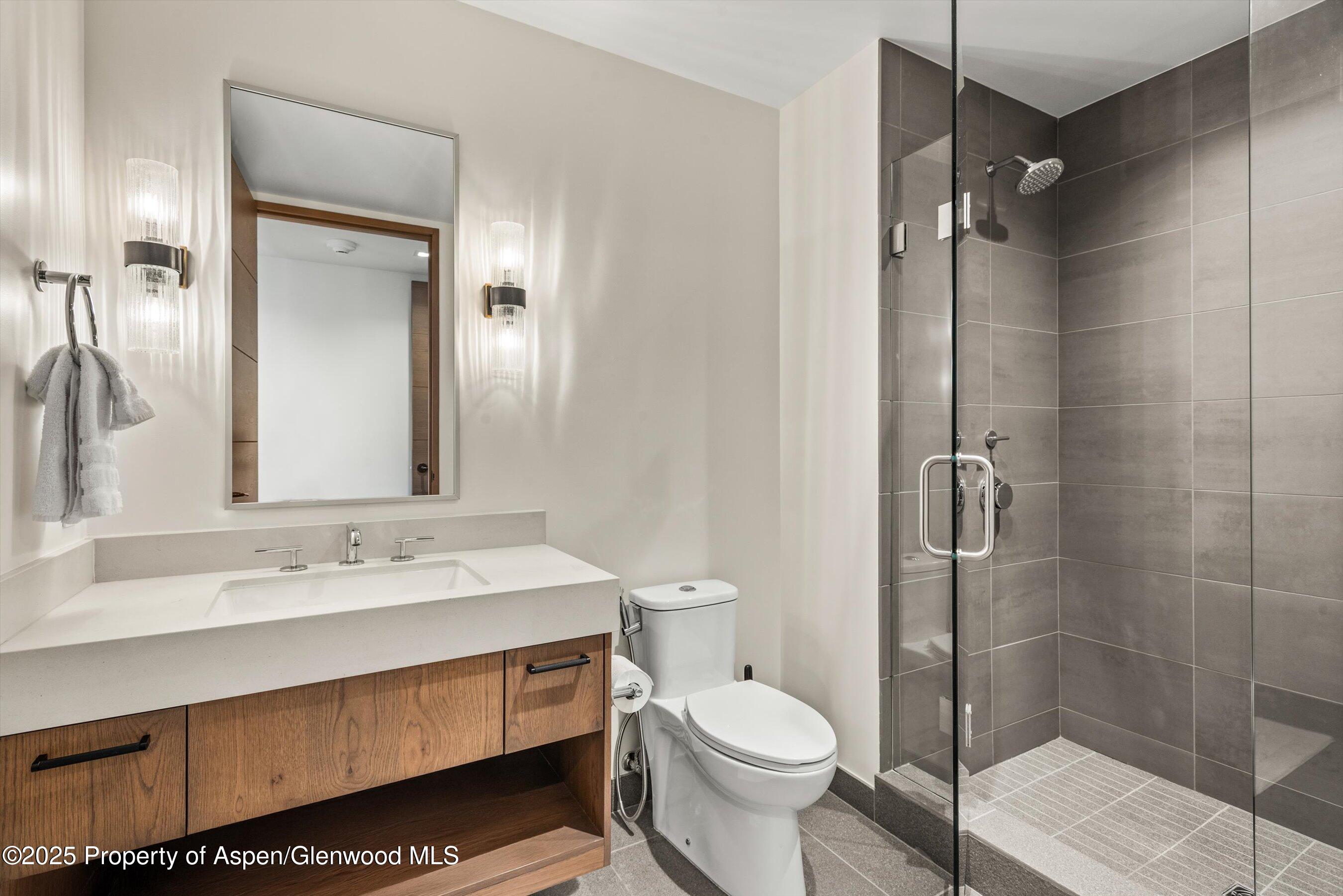 180 Wood Road, Unit 404 Snowmass Village, CO 81615 - Photo 12 of 51 404 2nd bathroom with showera