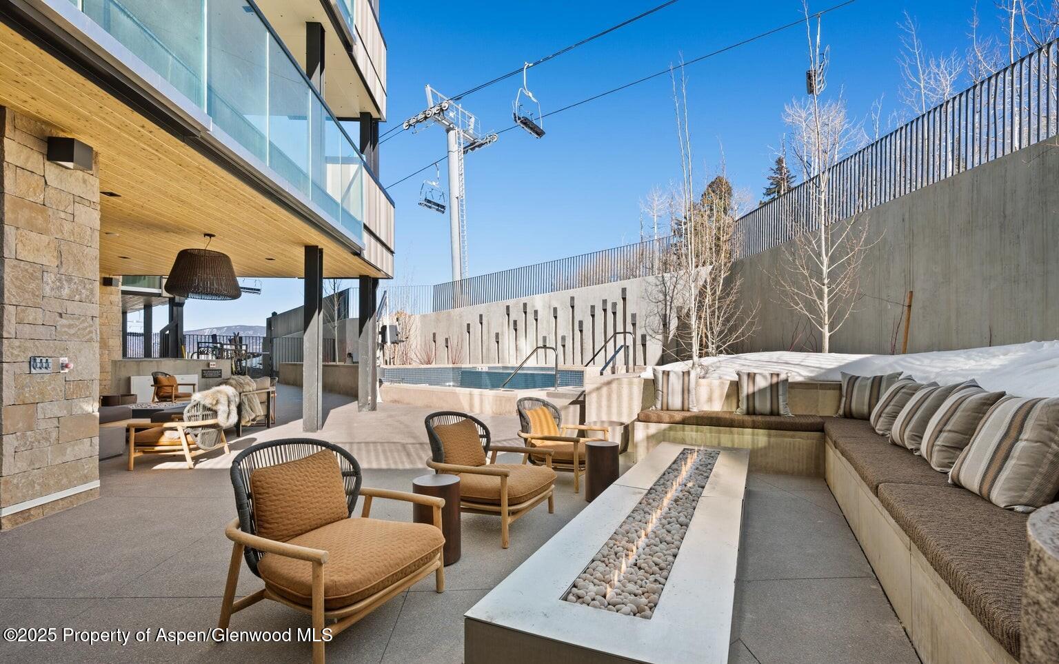 180 Wood Road, Unit 404 Snowmass Village, CO 81615 - Photo 19 of 51 404 aura hot tubs and lounge exterior