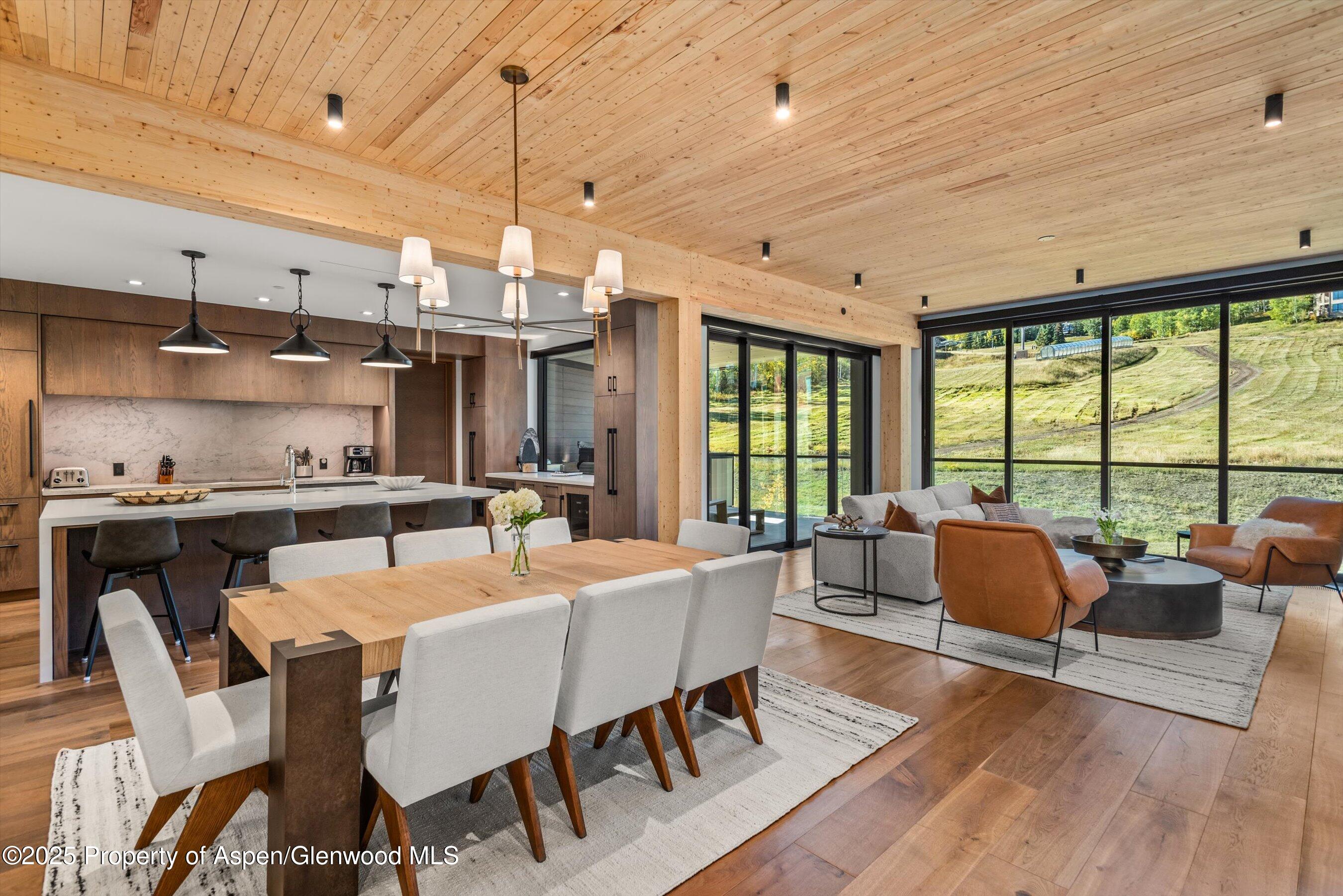 180 Wood Road, Unit 404 Snowmass Village, CO 81615 - Photo 2 of 51 404 open living area with living room- d