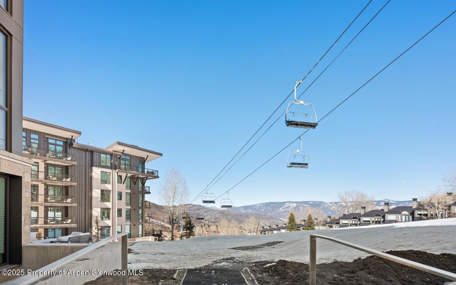 180 Wood Road, Unit 404 Snowmass Village, CO 81615 - Photo 22 of 51 a view of a city from a terrace