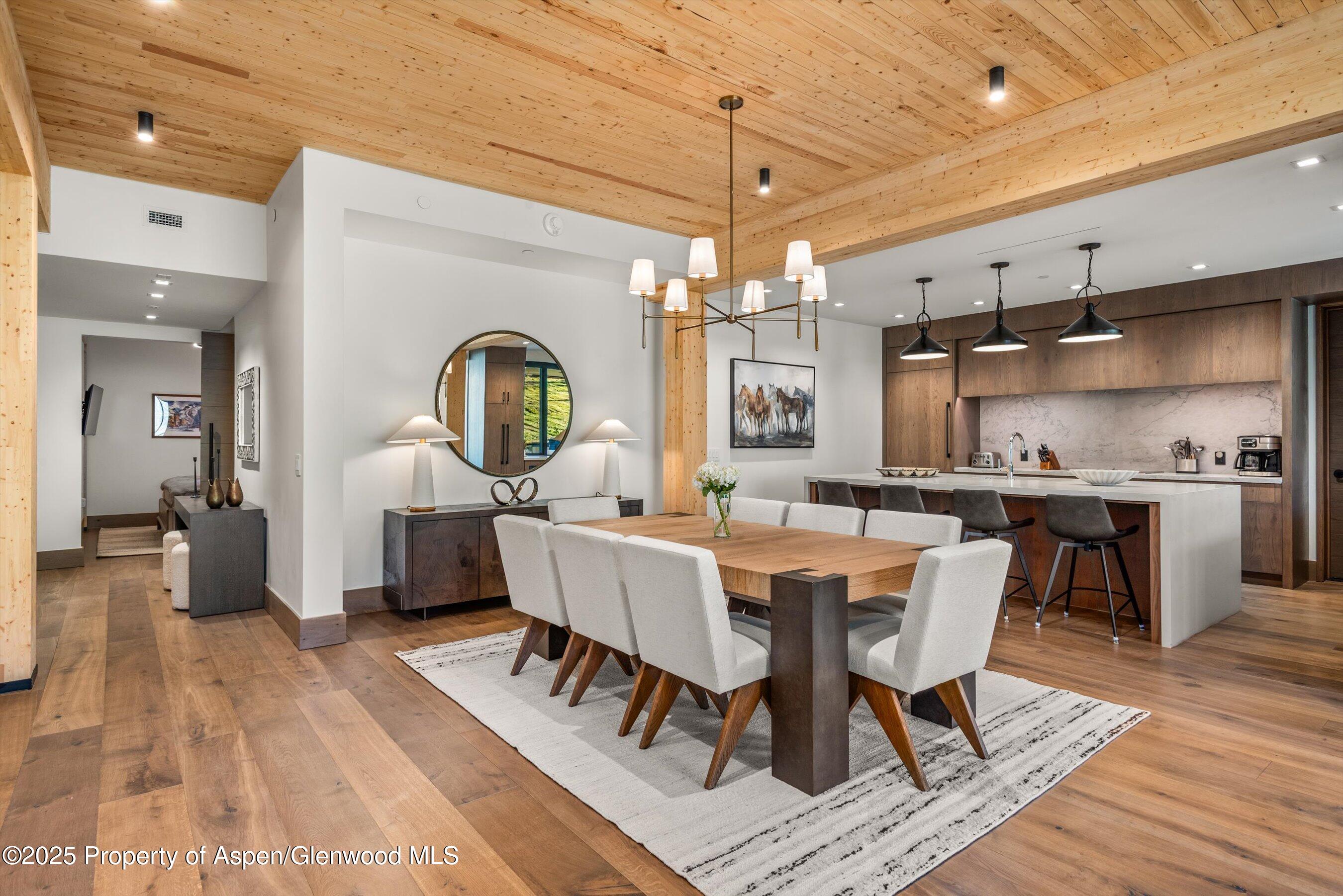 180 Wood Road, Unit 404 Snowmass Village, CO 81615 - Photo 25 of 51 404 dining and kitchena